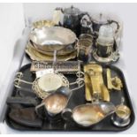 A selection of silver plated and brass wares.