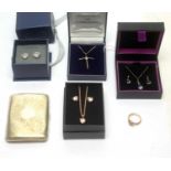 A 9ct yellow gold crucifix pendant, and other jewellery