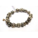 A silver Pandora bracelet,