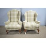 Georgian-style lady's and gent's armchairs in a tartan tweed.