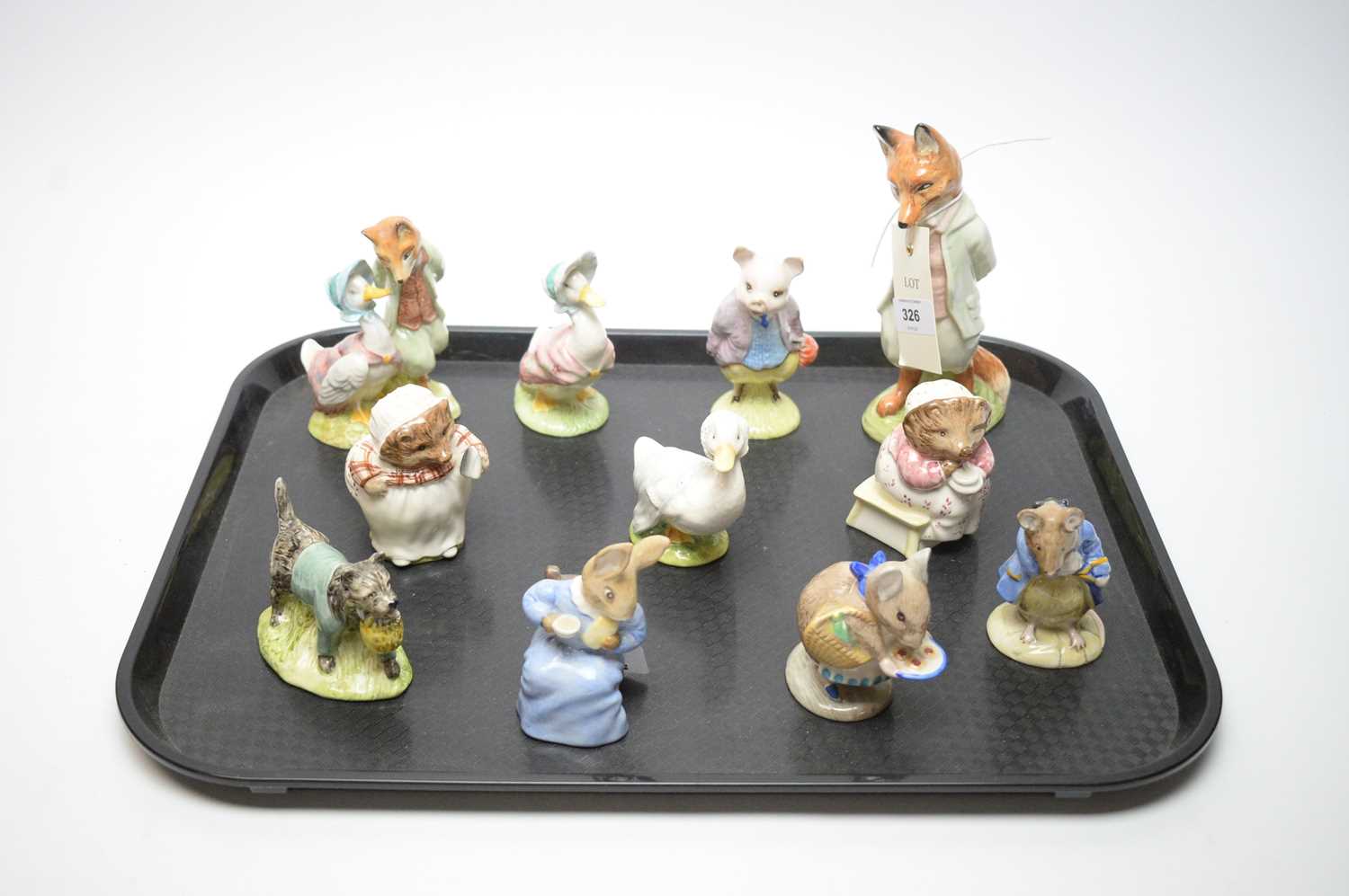 A collection of Royal Albert Beatrix Potter figures.