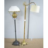 Ornate brass reading lamp; and a lamp standard.