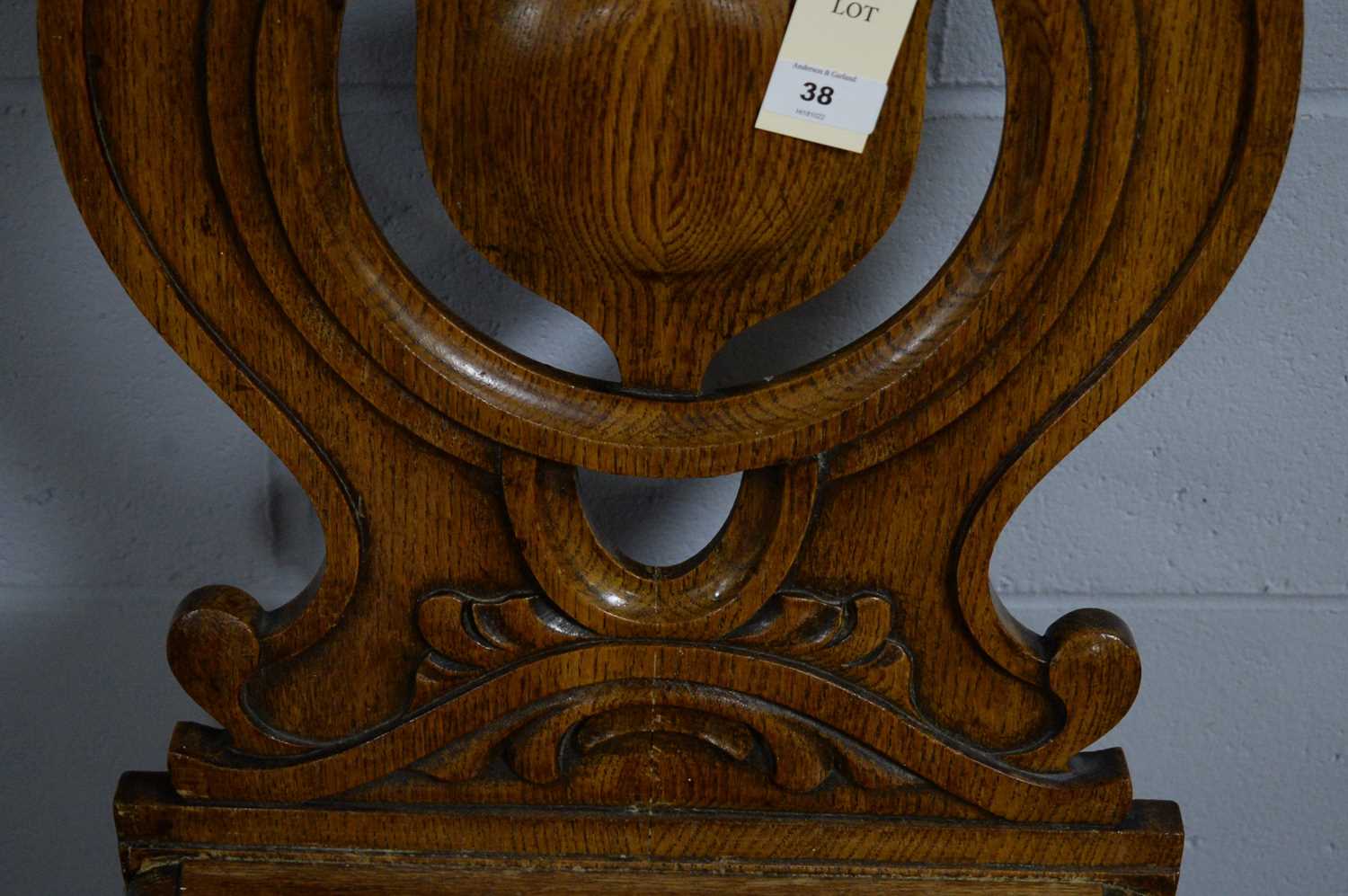 A carved oak hall chair, by Priest of Blackfriars. - Image 3 of 4