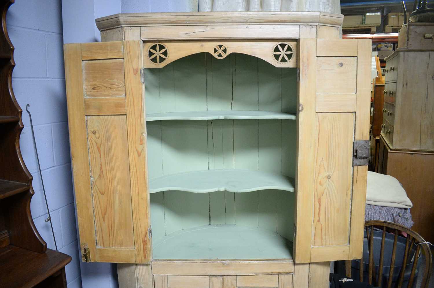 A 19th Century stripped pine floor standing corner cupboard. - Image 2 of 3