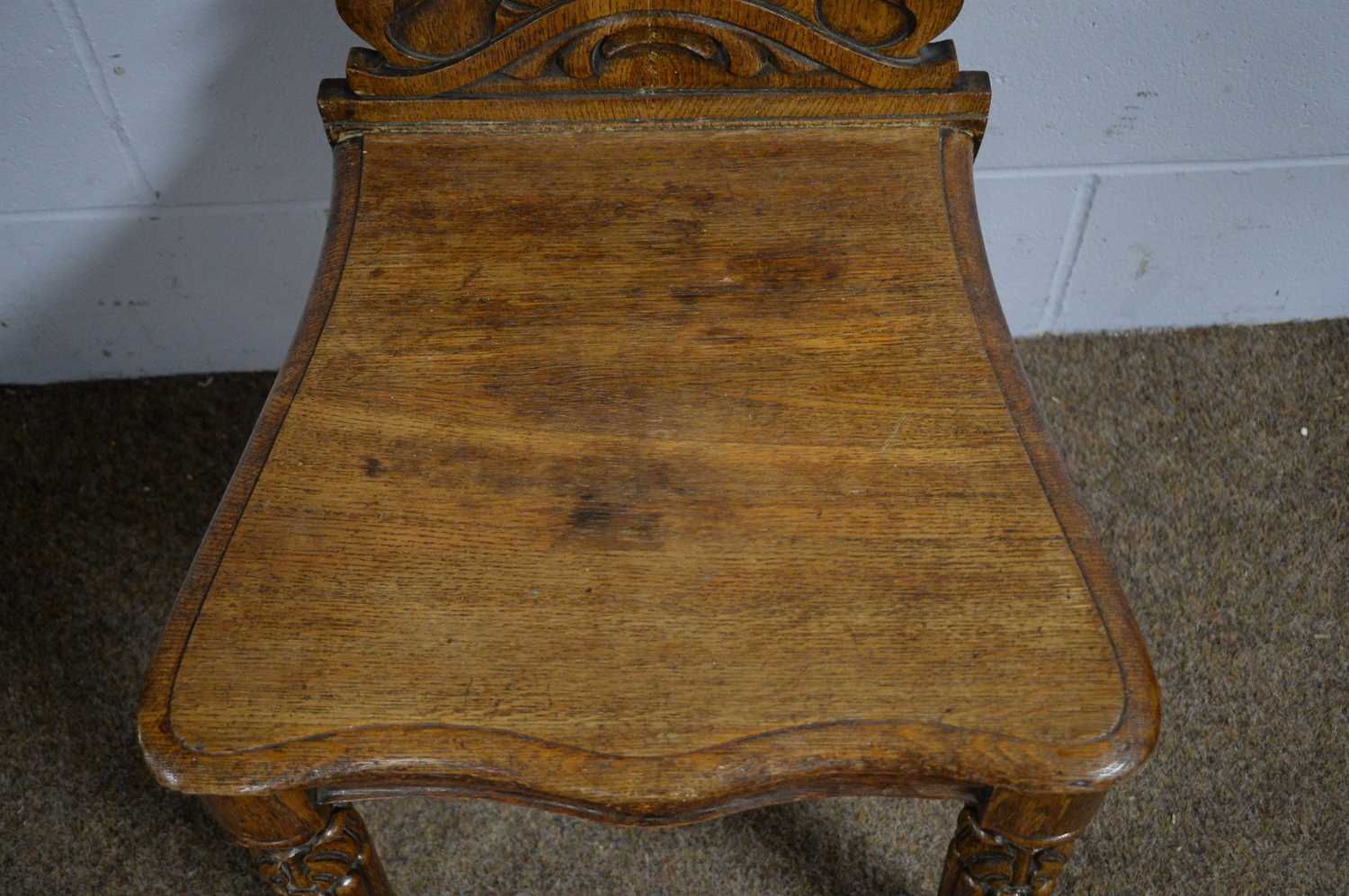 A carved oak hall chair, by Priest of Blackfriars. - Image 4 of 4