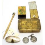A selection of medals, compass and other items