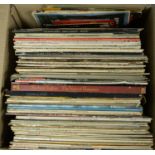 A selection of assorted vinyl LPs.