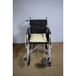 A modern folding wheelchair.