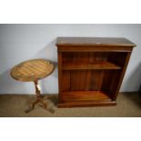 Early 20th C open bookcase; and a Victorian tripod games table.