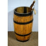 A coopered barrel stick stand, and two walking sticks.