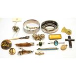 A selection of brooches and other jewellery,