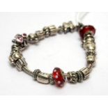 A silver Pandora bracelet,