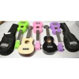A collection of Mahalo ukuleles.