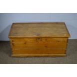 A vintage stripped pine two-handled blanket box.