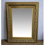 A modern decorative bevelled wall mirror.