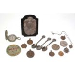 A selection of trophy medallions; Rifle Association teaspoons; and others.