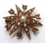 A pink sapphire and seed pearl brooch,