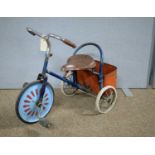 A vintage child's tricycle.