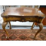 A Georgian-style burr walnut serpentine fronted card table.