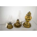 Three oil lamps