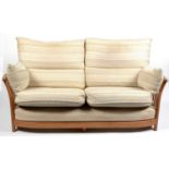 Ercol: an elm ‘Renaissance’ sofa.