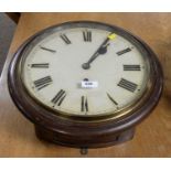 A late Victorian circular stained oak wall timepiece