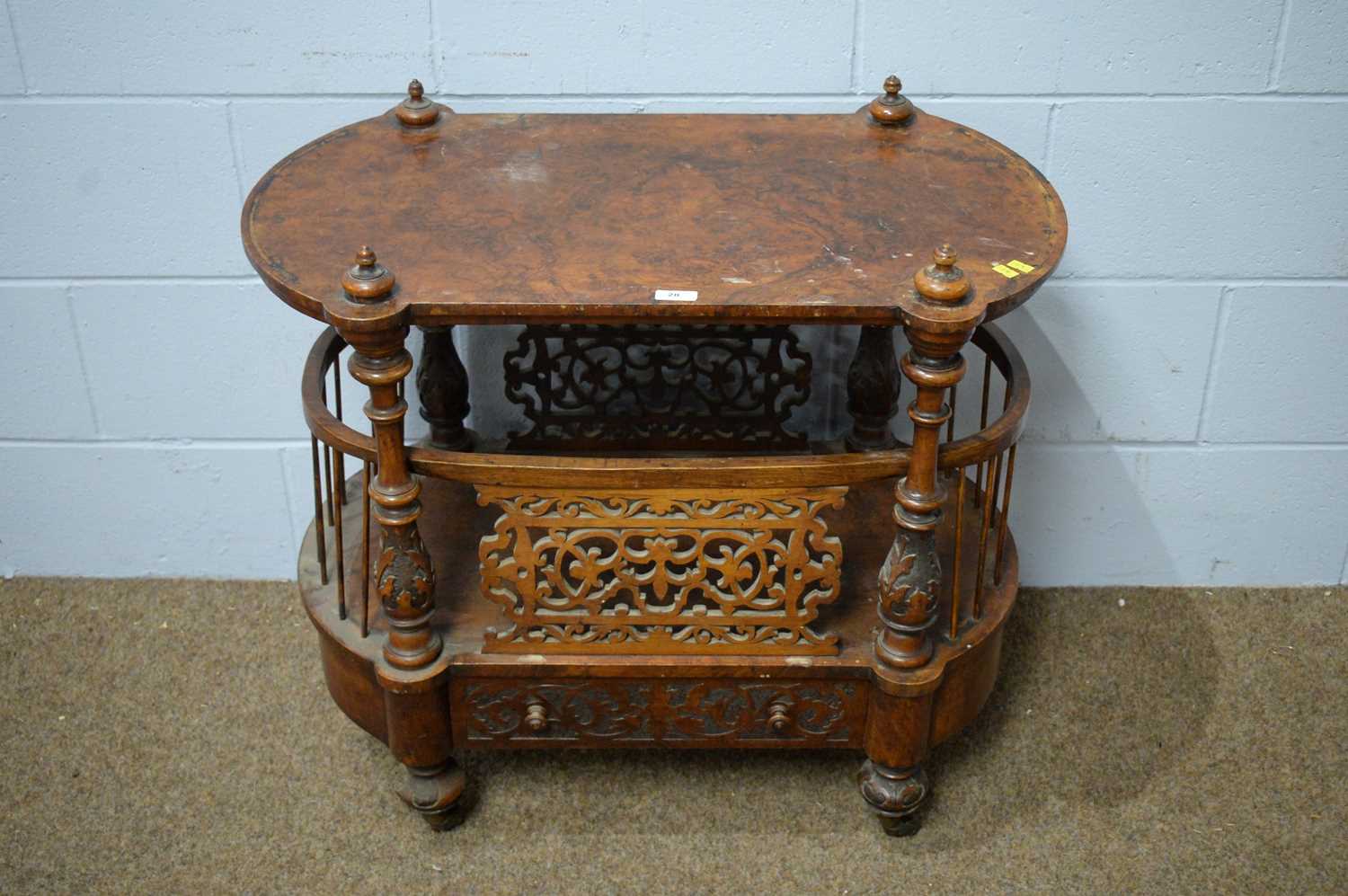 A Victorian walnut and burr walnut carved Canterbury.