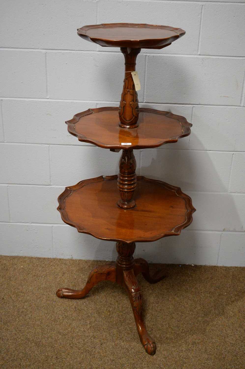 A Georgian-style mahogany graduated three-tier whatnot.