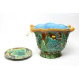 A Majolica planter; and a Majolica leaf plate,