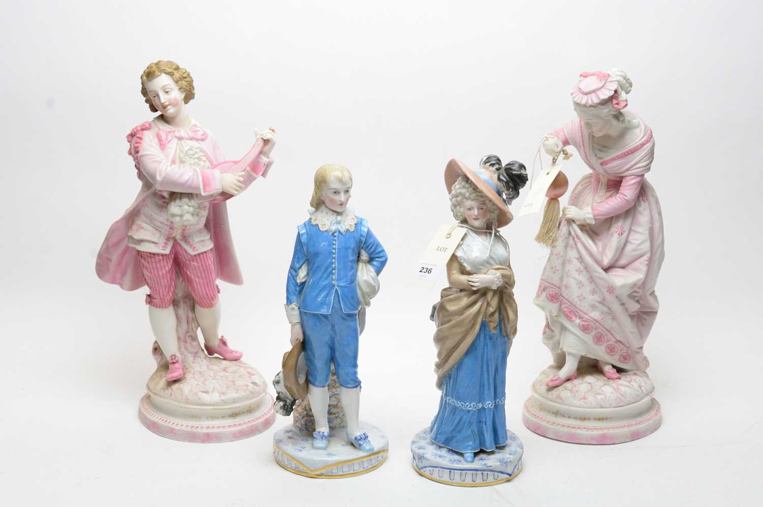 A pair of 19th Century German ceramic figures