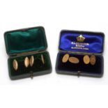 Two pairs of gold cufflinks.