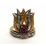 A ruby and diamond ring of flame design,
