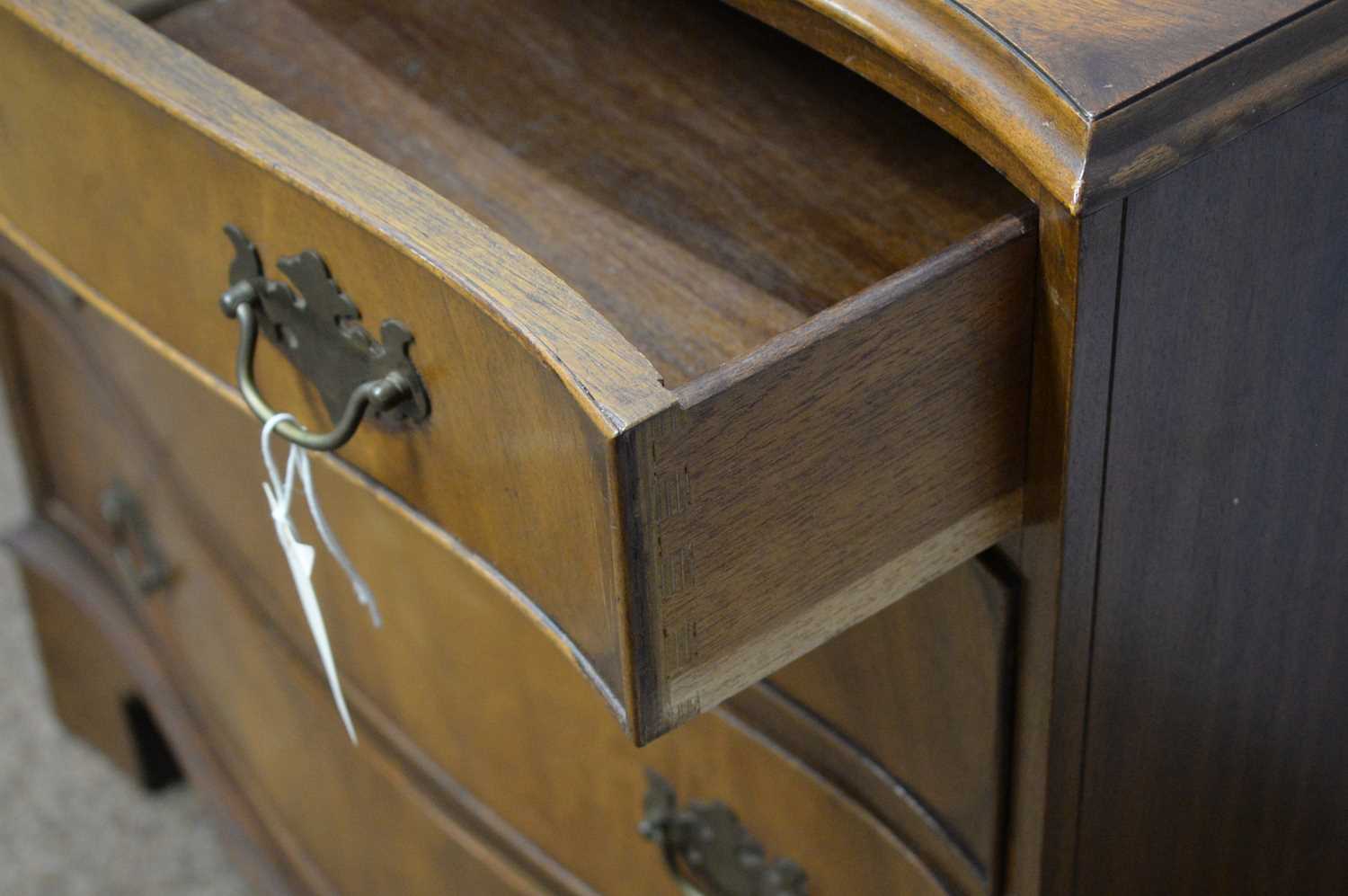 A Georgian-style reproduction serpentine chest. - Image 4 of 6