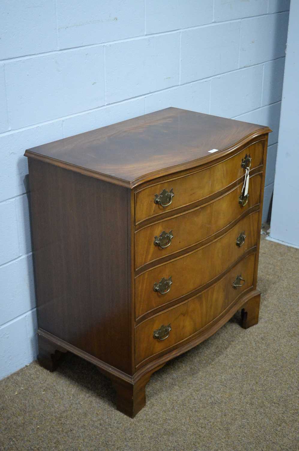 A Georgian-style reproduction serpentine chest. - Image 2 of 6