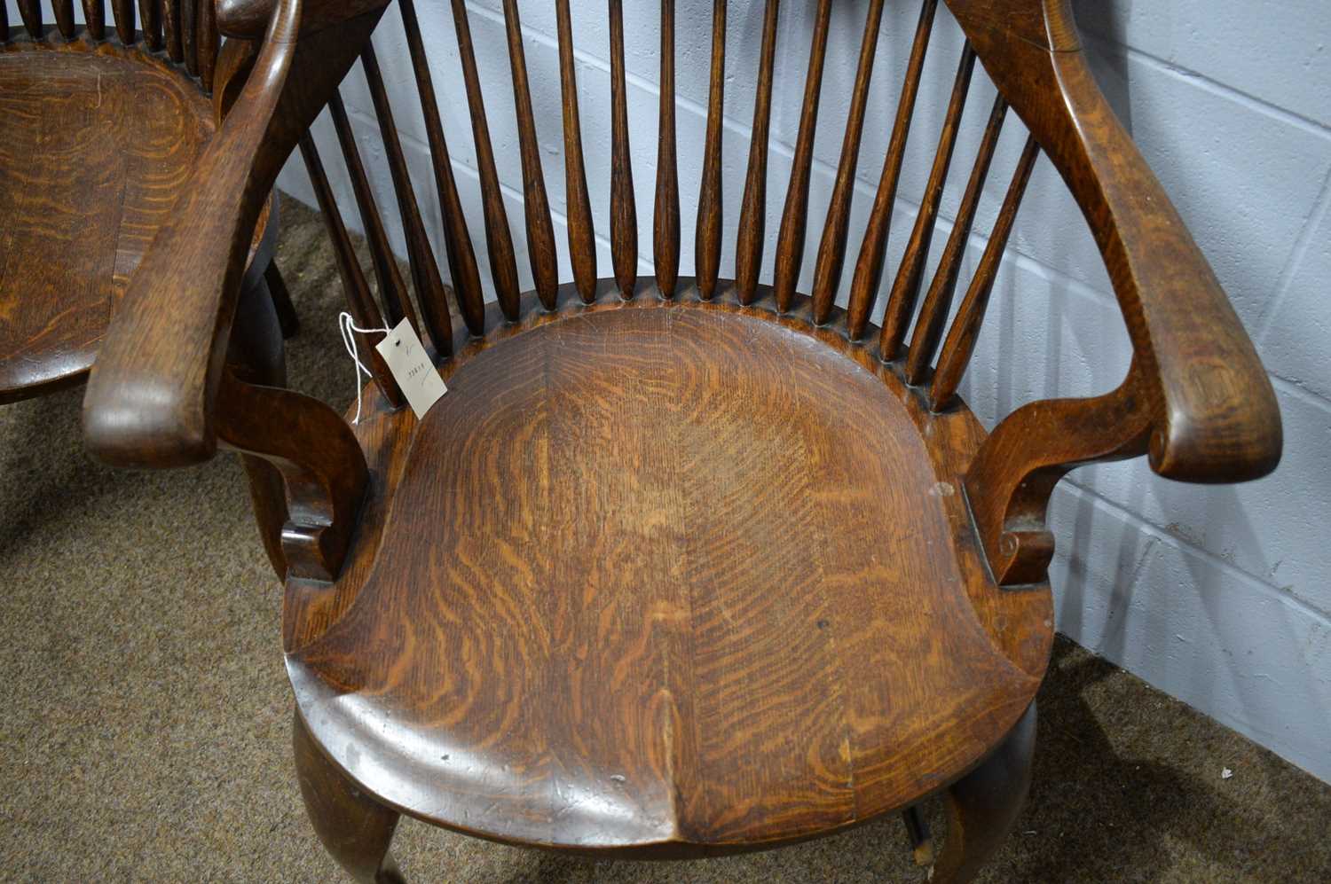 A pair of early 20th Century oak bow-back smokers chairs. - Image 4 of 5