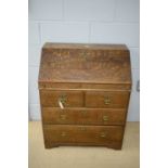 An 18th Century oak bureau.