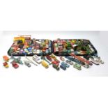 A collection of loose die cast model cars, planes and other vehicles