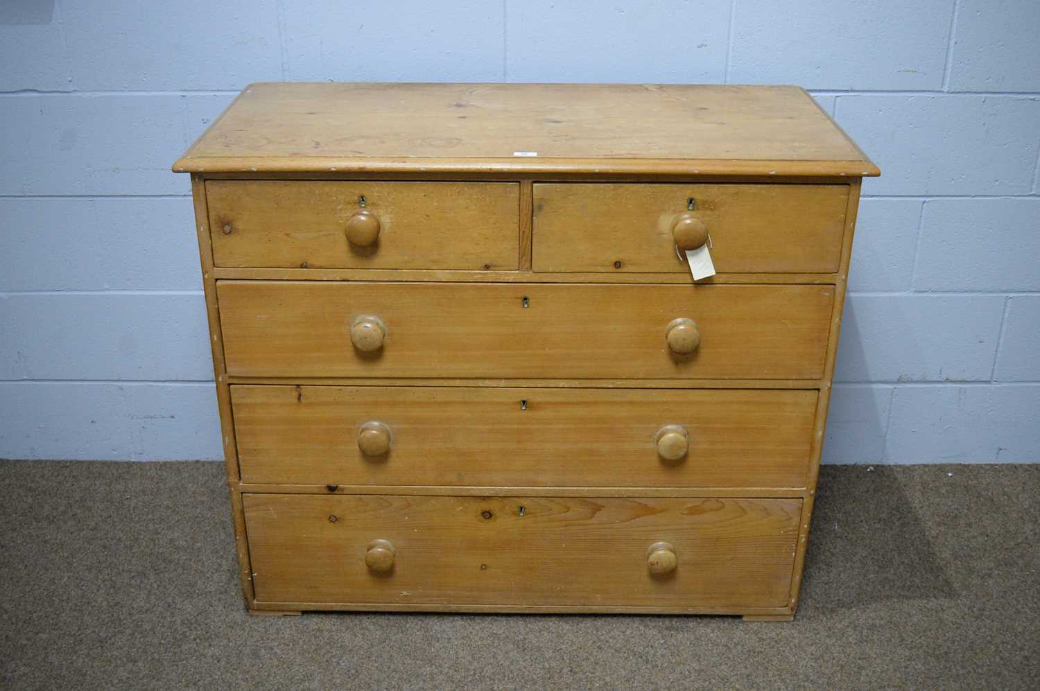 A Victorian stripped pine chest.