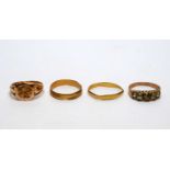 Four gold rings, one set paste stones