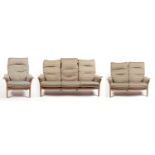 Ercol: an elm ‘Saville’ three-piece suite.