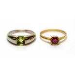 A ruby ring and a peridot ring
