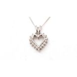 A heart-shaped diamond pendant,