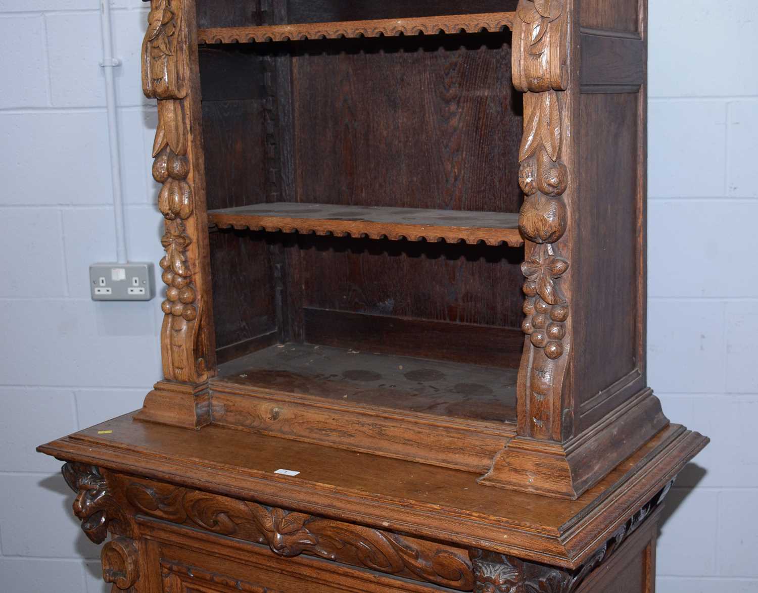 A profusely carved North European 19th C oak bookcase cabinet. - Image 3 of 12