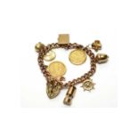 A 9ct yellow gold curb link charm bracelet,
