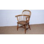 A 19th Century ash Windsor armchair.