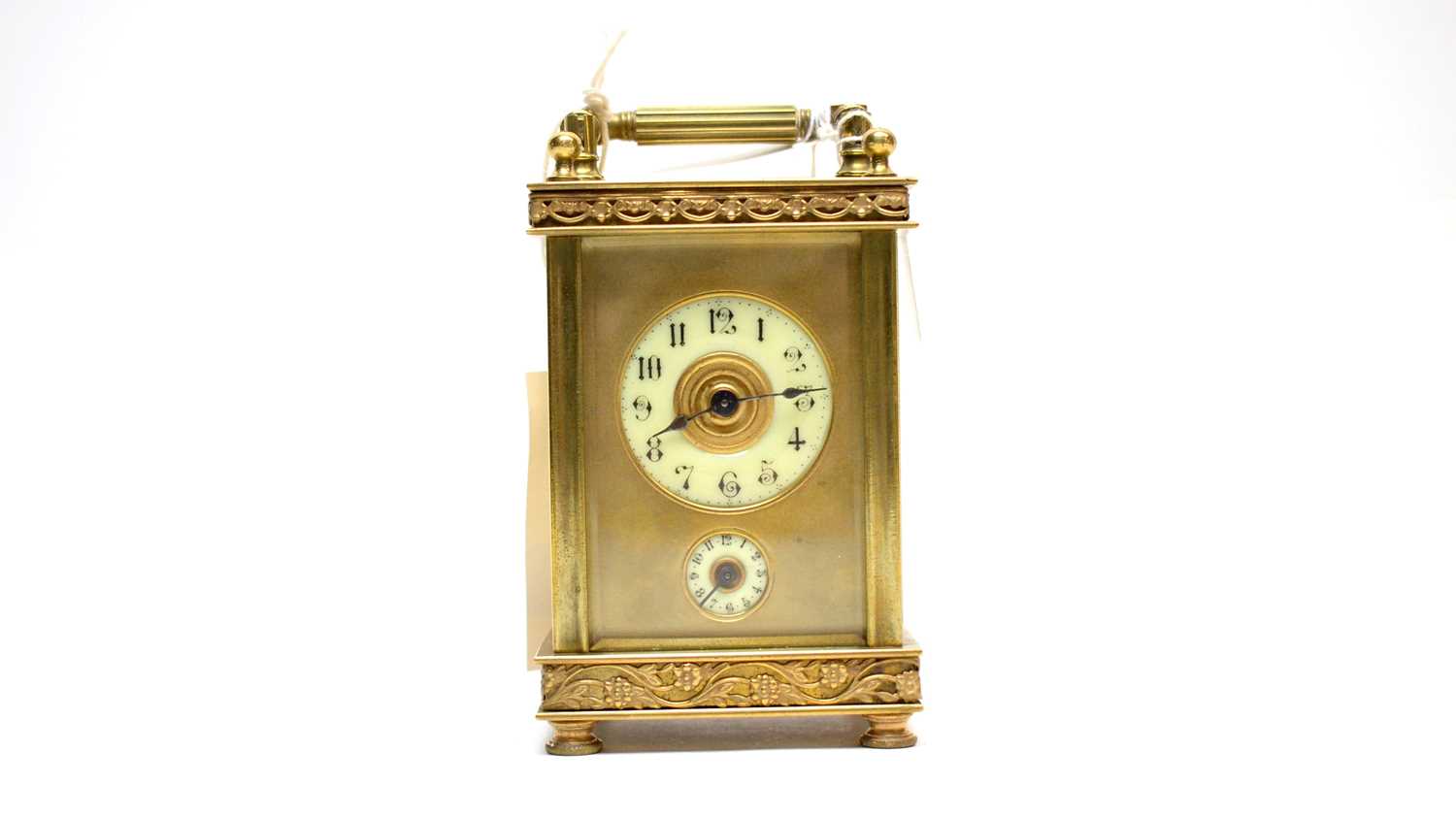 A 19th Century brass carriage clock.