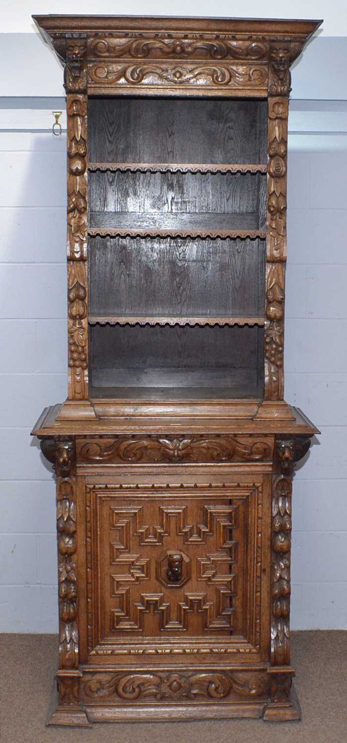 A profusely carved North European 19th C oak bookcase cabinet. - Image 7 of 12