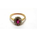 A synthetic ruby and paste cluster ring,