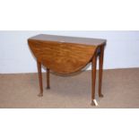A mid 18th Century mahogany drop leaf dining table.
