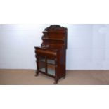 A well carved Victorian mahogany chiffonier.